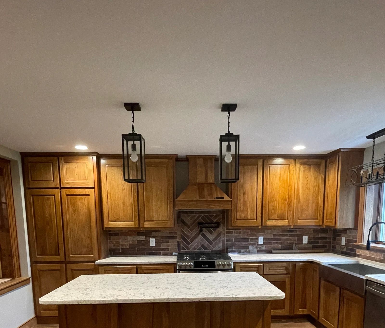 Wood kitchen cabinets and an island