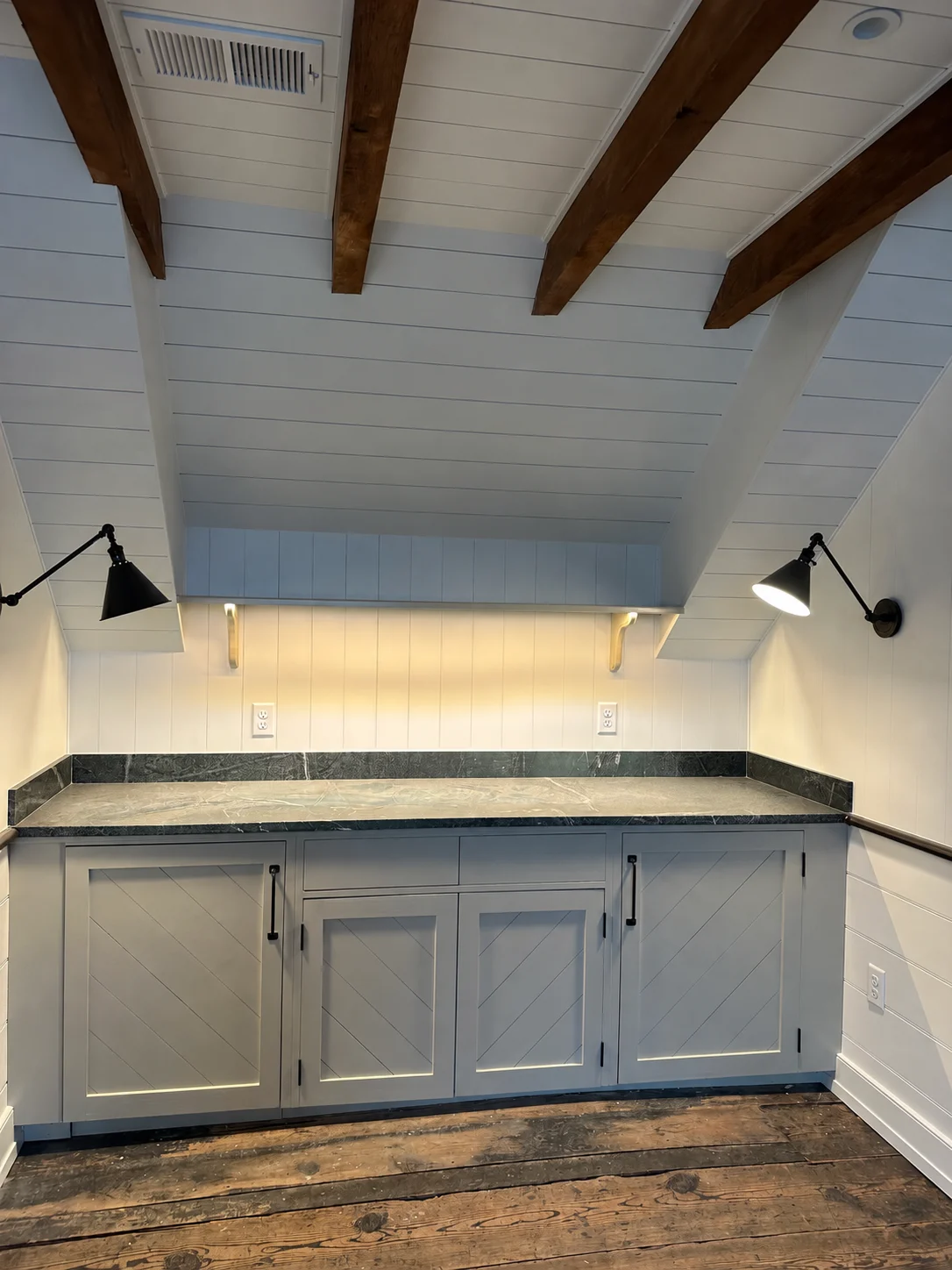 Wood-beamed interior with built-in cabinetry